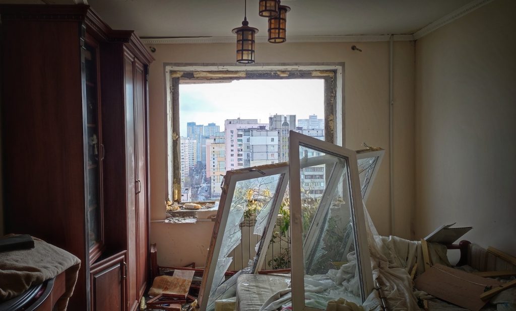 image from inside blown up apartment, windows shattered