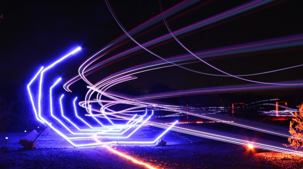 drones racing through led-lit checkpoints