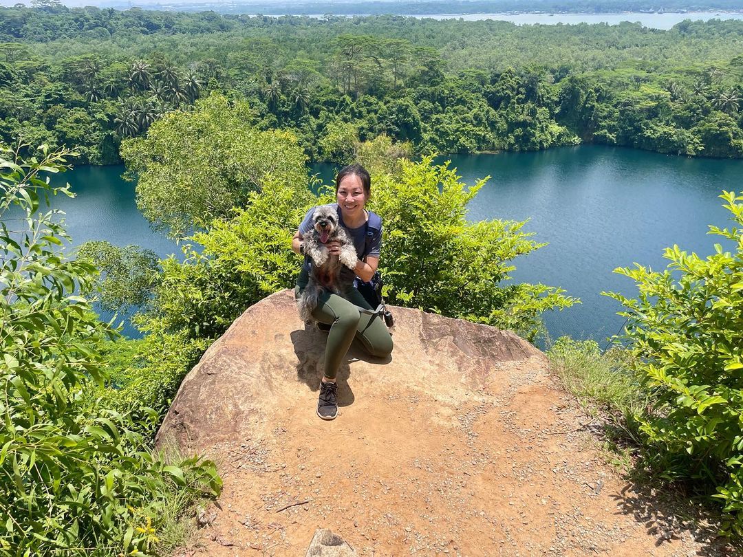 woman with her pet dog at puaka hill