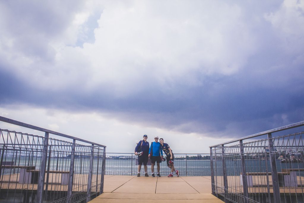 ubin bike trail group posing for photo in front of scenic point 